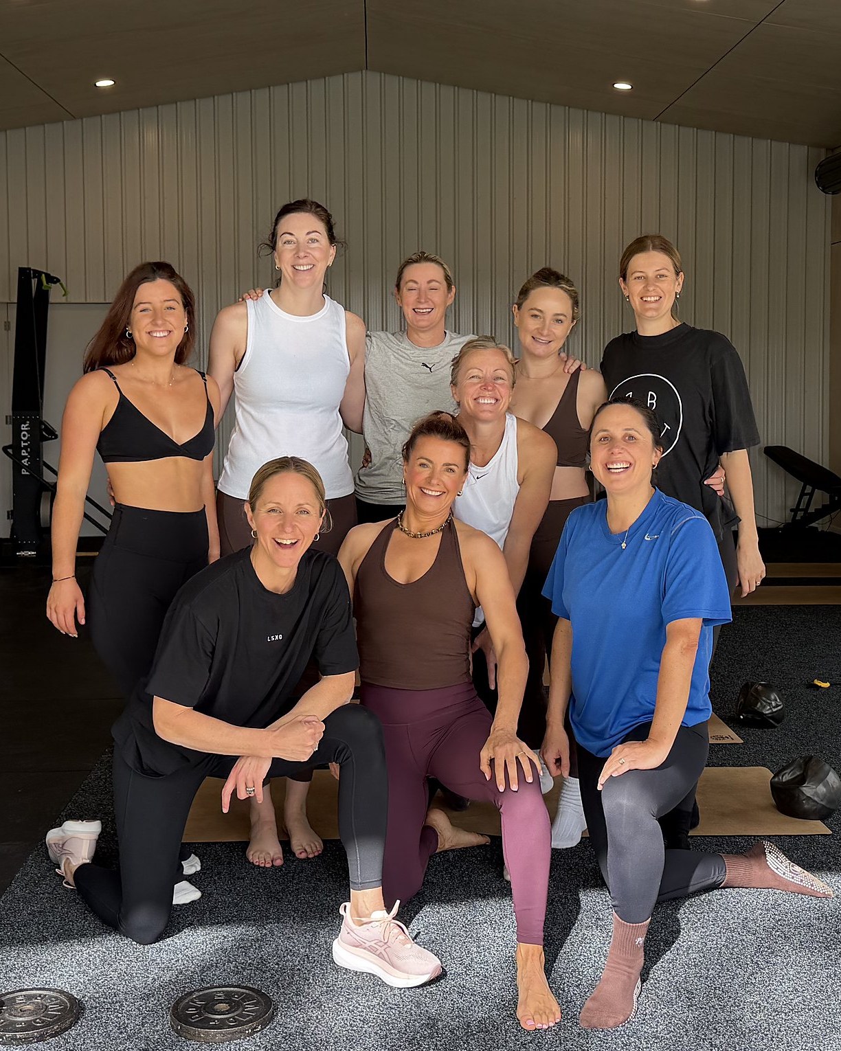 The Fit Shed crew inside the shed. Kate is front left, in black